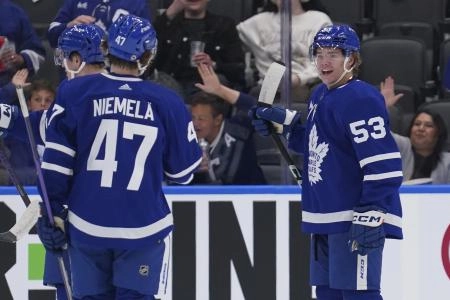 Easton Cowan and Topi Niemela celebrate in a Maple Leafs pre-season game Easton Cowan and Topi Niemela celebrate in a Maple Leafs pre-season game