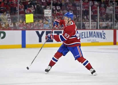 Apr 25, 2025; Montreal, Quebec, CAN; Montreal Canadiens forward Ivan Demidov (93) shoots the puck during the warmup period in game three of the first round of the 2025 Stanley Cup Playoffs against the Washington Capitals at the Bell Centre. Mandatory Credit: Eric Bolte-Imagn Imag