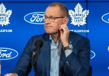 Maple Leafs GM Brad Treliving speaks to reporters during a media presser.