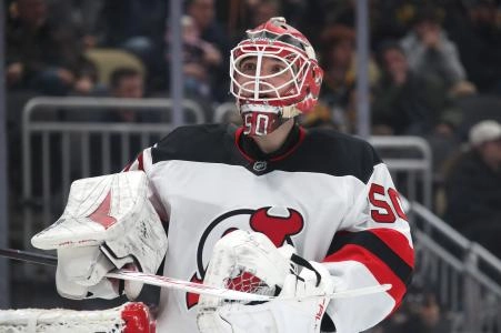 Feb 4, 2025; Pittsburgh, Pennsylvania, USA; New Jersey Devils goaltender Nico Daws (50) looks on against the Pittsburgh Penguins during the third period at PPG Paints Arena. Mandatory Credit: Charles LeClaire-Imagn Images