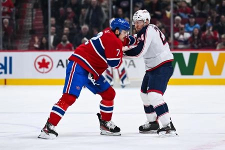 Nov 16, 2024; Montreal, Quebec, CAN; Columbus Blue Jackets right wing Mathieu Olivier (24) and Montreal Canadiens defenseman Arber Xhekaj (72) fight during the second period at Bell Centre. Mandatory Credit: David Kirouac-Imagn Images