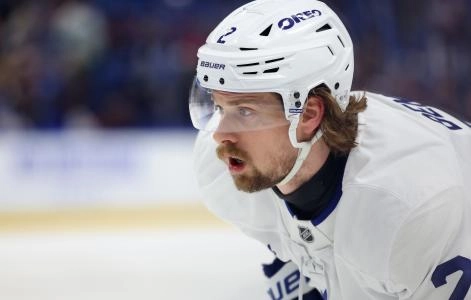 Apr 15, 2025; Buffalo, New York, USA; Toronto Maple Leafs defenseman Simon Benoit (2) waits for the face-off during the first period against the Buffalo Sabres at KeyBank Center. Mandatory Credit: Timothy T. Ludwig-Imagn Images