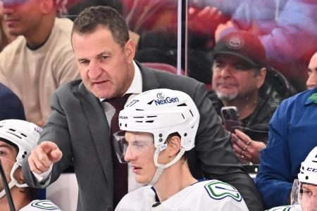 Adam Foote giving instructions to Vancouver Canucks defenseman Tyler Myers. Adam Foote giving instructions to Vancouver Canucks defenseman Tyler Myers.