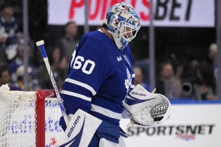 May 14, 2025; Toronto, Ontario, CAN; Toronto Maple Leafs goaltender Joseph Woll (60) looks down at a puck in his glove after a save against the Florida Panthers during the second period of game five of the second round of the 2025 Stanley Cup Playoffs at Scotiabank Arena