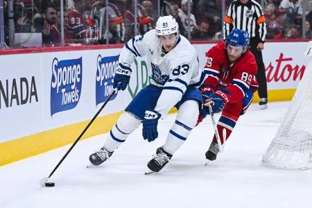Sep 25, 2025; Montreal, Quebec, CAN; Toronto Maple Leafs defenseman Marshall Rifai (83) defends the puck against Montreal Canadiens right wing Joshua Roy (89) during the first period at Bell Centre Sep 25, 2025; Montreal, Quebec, CAN; Toronto Maple Leafs defenseman Marshall Rifai (83) defends the puck against Montreal Canadiens right wing Joshua Roy (89) during the first period at Bell Centre
