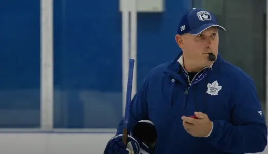 Toronto Maple Leafs head coach Craig Berube instructs his players during a practice drill.
