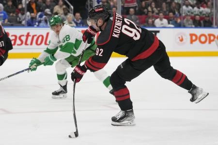 Mar 16, 2024; Toronto, Ontario, CAN; Carolina Hurricanes forward Evgeny Kuznetsov (92) goes to shoot the puck during overtime against the Toronto Maple Leafs at Scotiabank Arena Mar 16, 2024; Toronto, Ontario, CAN; Carolina Hurricanes forward Evgeny Kuznetsov (92) goes to shoot the puck during overtime against the Toronto Maple Leafs at Scotiabank Arena