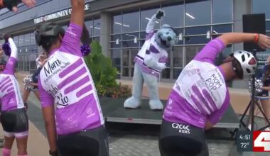 Cyclists raising money for cancer research warm up with Louie