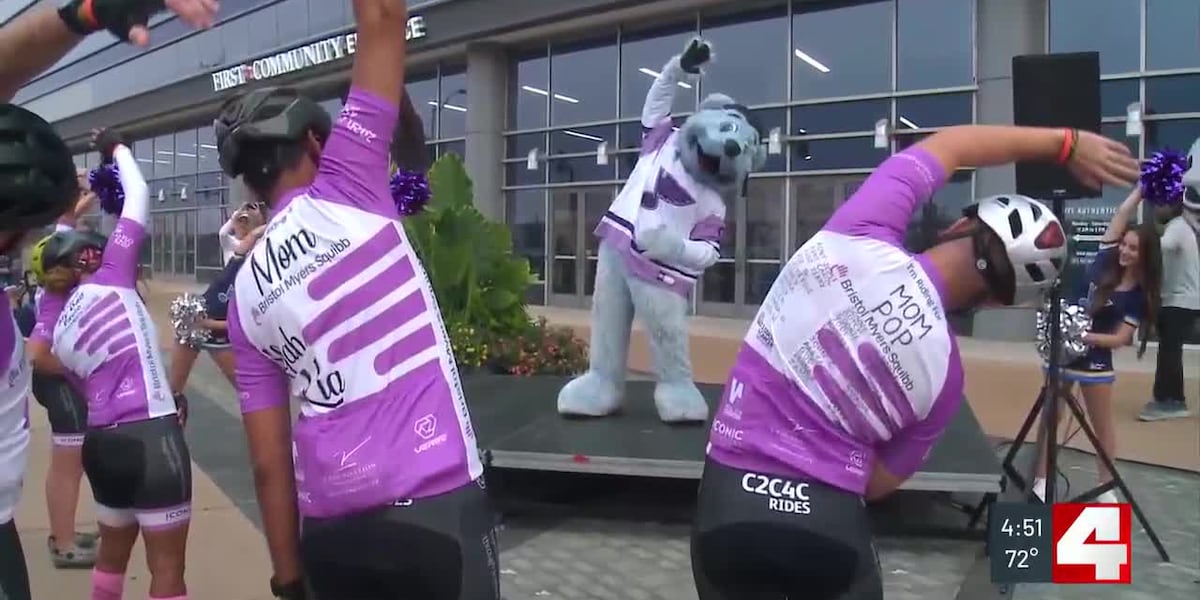 Cyclists raising money for cancer research warm up with Louie