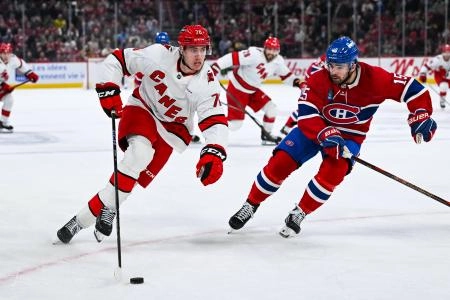 Apr 16, 2025; Montreal, Quebec, CAN; Carolina Hurricanes center Skyler Brind'Amour (76) plays the puck against Montreal Canadiens center Alex Newhook (15) in the second period at Bell Centre. Mandatory Credit: David Kirouac-Imagn Images Apr 16, 2025; Montreal, Quebec, CAN; Carolina Hurricanes center Skyler Brind'Amour (76) plays the puck against Montreal Canadiens center Alex Newhook (15) in the second period at Bell Centre. Mandatory Credit: David Kirouac-Imagn Images