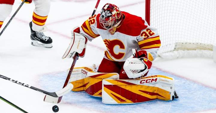 Wolf shines as Flames beat Kraken in shootout - Calgary