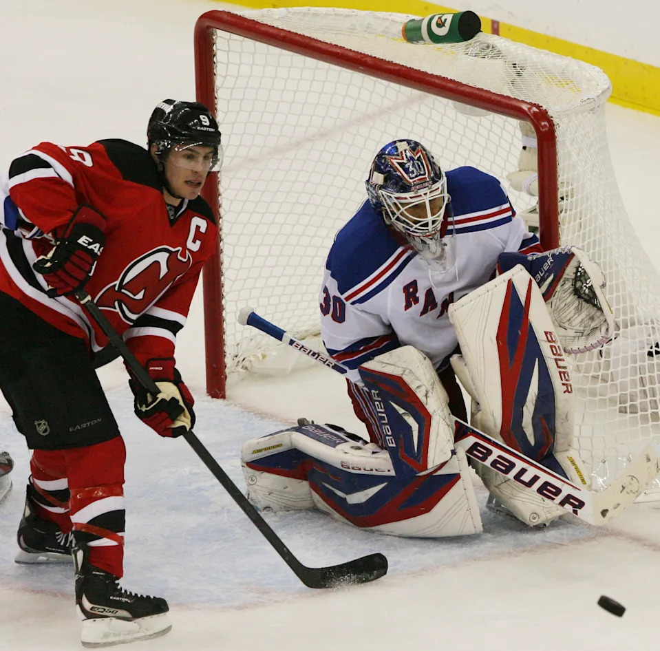 96945 -- Newark, New Jersey -- May 19, 2012 --- New York Rangers vs New Jersey Devils -- Eastern Conference Finals -- Game 3 -- Devils #9 Zach Parise waits for a rebound after Rangers #30 Henrik Lundqvist made a save in the third period.