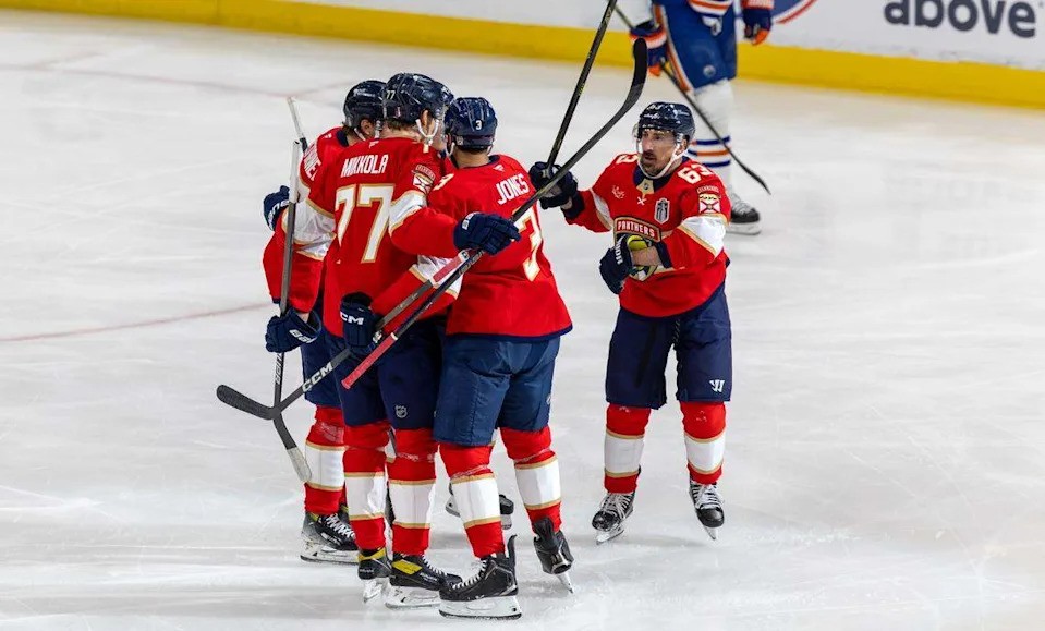 Florida Panthers center Brad Marchand (63) celebrates with teammates after scoring during the first period against the Edmonton Oilers in Game 3 of the NHL Stanley Cup Final at Amerant Bank Arena on Monday, June 9, 2025, in Sunrise, Fla.