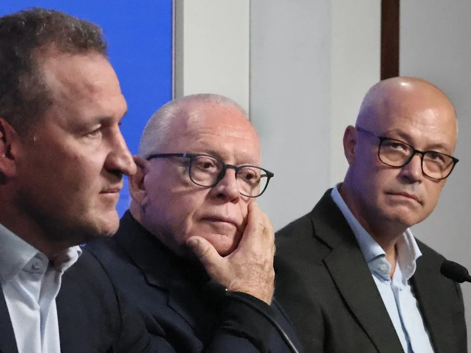  Vancouver Canucks coach Adam Foote, president of hockey operations Jim Rutherford and general manager Patrick Alvin (l-r) at a pre season press conference.