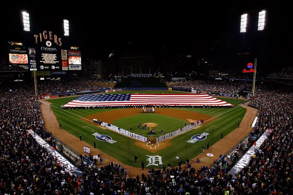DETROIT - OCTOBER 21: The Detroit Tigers and the St. Louis Cardinals line up on the field before the start of Game One of the 2006 World Series on October 21, 2006 at Comerica Park in Detroit, Michigan.. (Photo by Jamie Squire/Getty Images)Getty