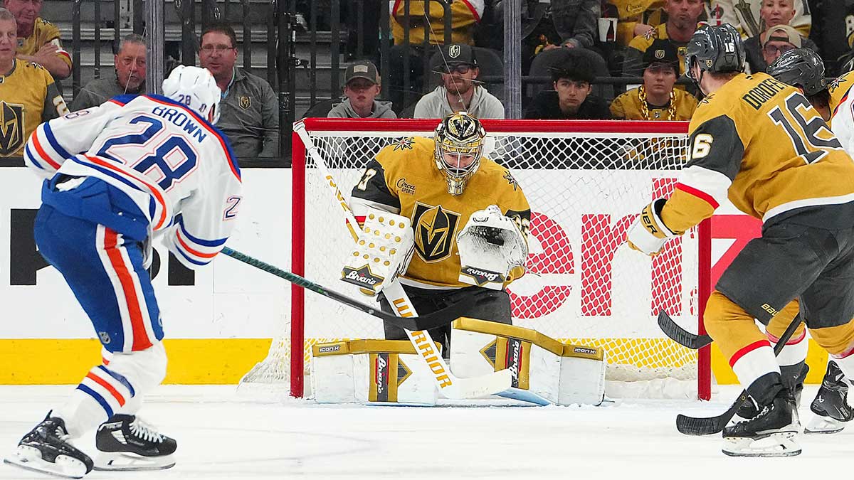 Vegas Golden Knights goaltender Adin Hill (33) makes a save against Edmonton Oilers right wing Connor Brown (28) during the second period of game five of the second round of the 2025 Stanley Cup Playoffs at T-Mobile Arena.