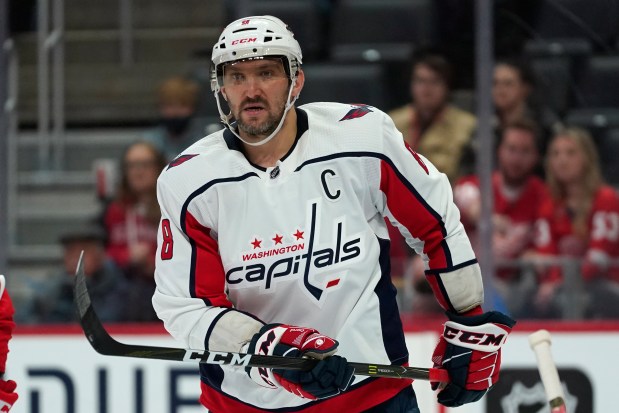 Washington Capitals left wing Alex Ovechkin (8) plays against the Detroit Red Wings in the third period of an NHL hockey game Thursday, Nov. 11, 2021, in Detroit. (AP Photo/Paul Sancya)
