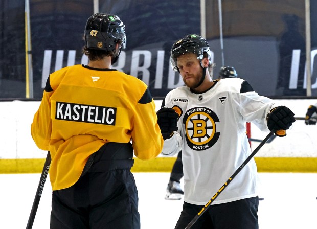 Boston Bruins right wing David Pastrnak (88) at practice Friday with Mark Kastelic. (Staff Photo By Stuart Cahill/Boston Herald) . (Staff Photo By Stuart Cahill/Boston Herald)