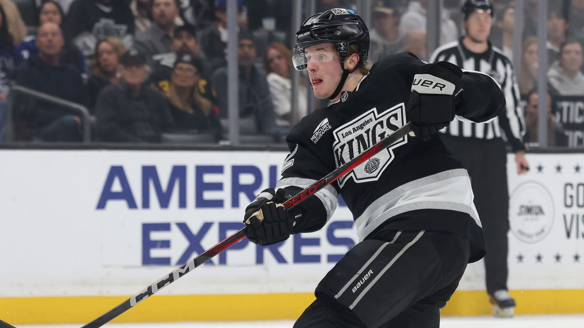 Los Angeles Kings defenseman Brandt Clarke (92) shoots during the second period against the Vancouver Canucks at Crypto.com Arena.