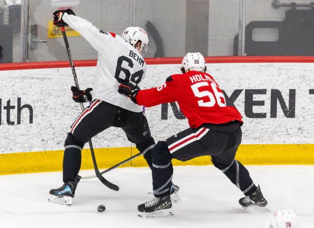 Chicago Blackhawks right wing Nathan Behm passes to a teammate during practice at the Fifth Third Arena in Chicago on Wednesday, Sept. 10, 2025. (Dominic Di Palermo/ Chicago Tribune)