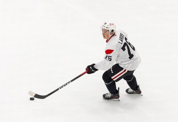 Chicago Blackhawks left wing Nick Lardis maneuvers the puck around the ice during practice at the Fifth Third Arena in Chicago on Wednesday, Sept. 10, 2025. (Dominic Di Palermo/ Chicago Tribune)