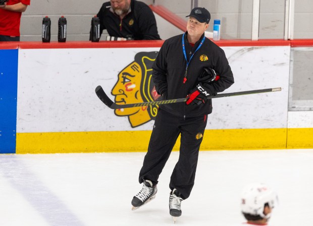 Rockford Ice Hogs head coach Jared Nightingale skates around while leading the Chicago Blackhawks in drills during practice at the Fifth Third Arena in Chicago on Wednesday, Sept. 10, 2025. (Dominic Di Palermo/ Chicago Tribune)
