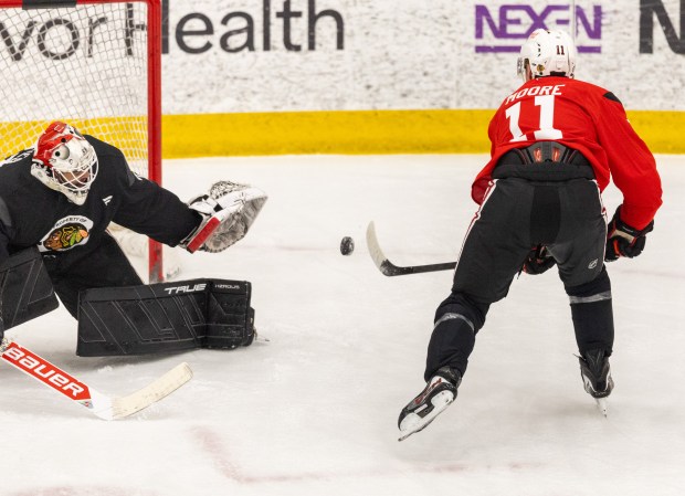 Chicago Blackhawks center Oliver Moore shoots on goal during practice at the Fifth Third Arena in Chicago on Wednesday, Sept. 10, 2025. (Dominic Di Palermo/ Chicago Tribune)