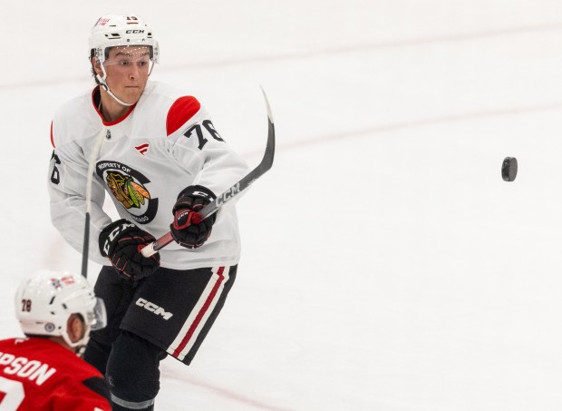 Chicago Blackhawks left wing Nick Lardis swats at a high puck during practice at the Fifth Third Arena in Chicago on Wednesday, Sept. 10, 2025. (Dominic Di Palermo/ Chicago Tribune)