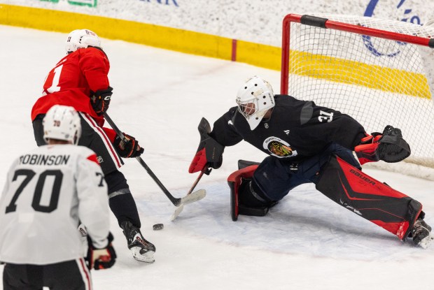 Chicago Blackhawks center Oliver Moore shoots on goal during practice at the Fifth Third Arena in Chicago on Wednesday, Sept. 10, 2025. (Dominic Di Palermo/ Chicago Tribune)