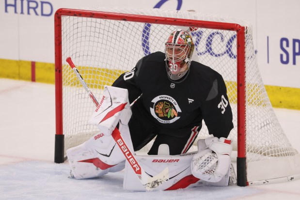 Goaltender Spencer Knight (30) practices Thursday, Sept. 18, 2025, as the Chicago Blackhawks begin training camp at Fifth Third Arena. (Brian Cassella/Chicago Tribune)