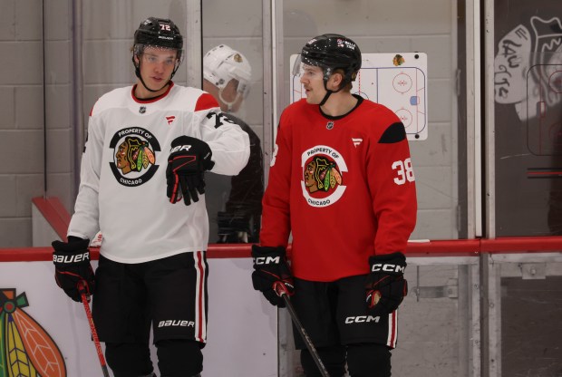 Defensemen Alex Vlasic (72) and Ethan Del Mastro (38) practice Thursday, Sept. 18, 2025, as the Chicago Blackhawks begin training camp at Fifth Third Arena. (Brian Cassella/Chicago Tribune)