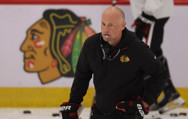 Head coach Jeff Blashill watches practice Thursday, Sept. 18, 2025, as the Chicago Blackhawks begin training camp at Fifth Third Arena. (Brian Cassella/Chicago Tribune)