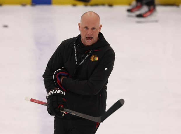 Head coach Jeff Blashill watches practice Thursday, Sept. 18, 2025, as the Chicago Blackhawks begin training camp at Fifth Third Arena. (Brian Cassella/Chicago Tribune)