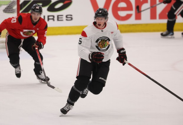 Defenseman Connor Murphy (5) practices Thursday, Sept. 18, 2025, as the Chicago Blackhawks begin training camp at Fifth Third Arena. (Brian Cassella/Chicago Tribune)