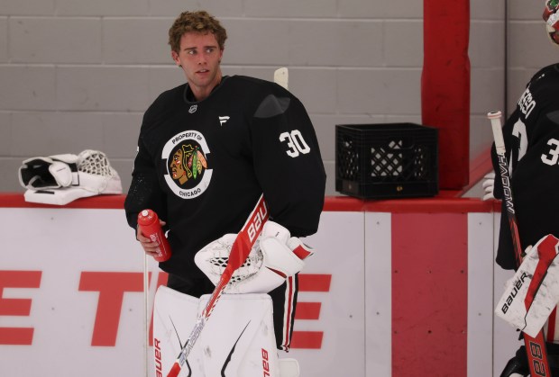 Goaltender Spencer Knight (30) practices Thursday, Sept. 18, 2025, as the Chicago Blackhawks begin training camp at Fifth Third Arena. (Brian Cassella/Chicago Tribune)