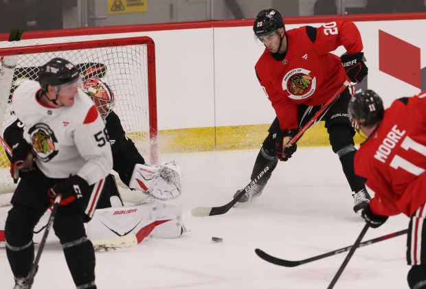 Center Ryan Greene (20) practices Thursday, Sept. 18, 2025, as the Chicago Blackhawks begin training camp at Fifth Third Arena. (Brian Cassella/Chicago Tribune)