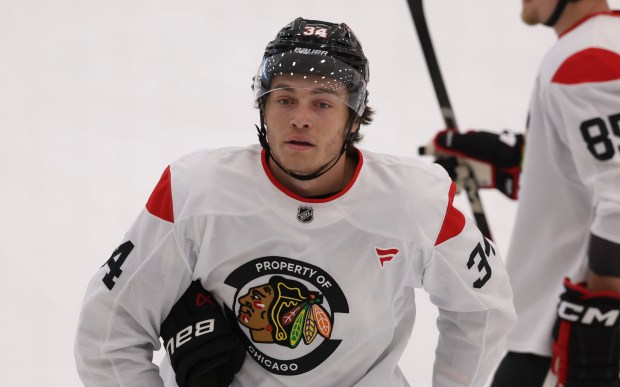 Center Colton Dach (34) practices Thursday, Sept. 18, 2025, as the Chicago Blackhawks begin training camp at Fifth Third Arena. (Brian Cassella/Chicago Tribune)