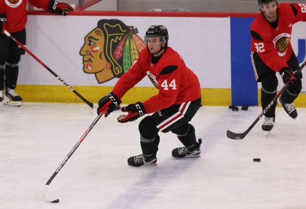 Defenseman Wyatt Kaiser (44) practices Thursday, Sept. 18, 2025, as the Chicago Blackhawks begin training camp at Fifth Third Arena. (Brian Cassella/Chicago Tribune)