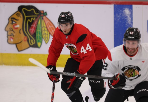 Defenseman Wyatt Kaiser (44) practices Thursday, Sept. 18, 2025, as the Chicago Blackhawks begin training camp at Fifth Third Arena. (Brian Cassella/Chicago Tribune)