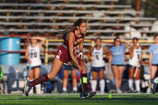 Wyoming Valley West’s Charlotte Yelen brings the ball down the...