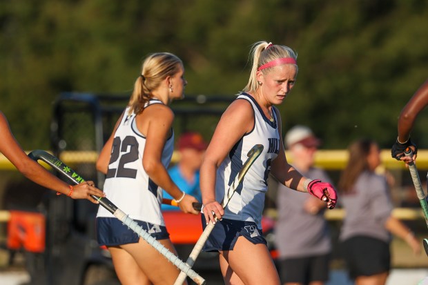 The Hill School’s Haley Elliott celebrates with her team after...