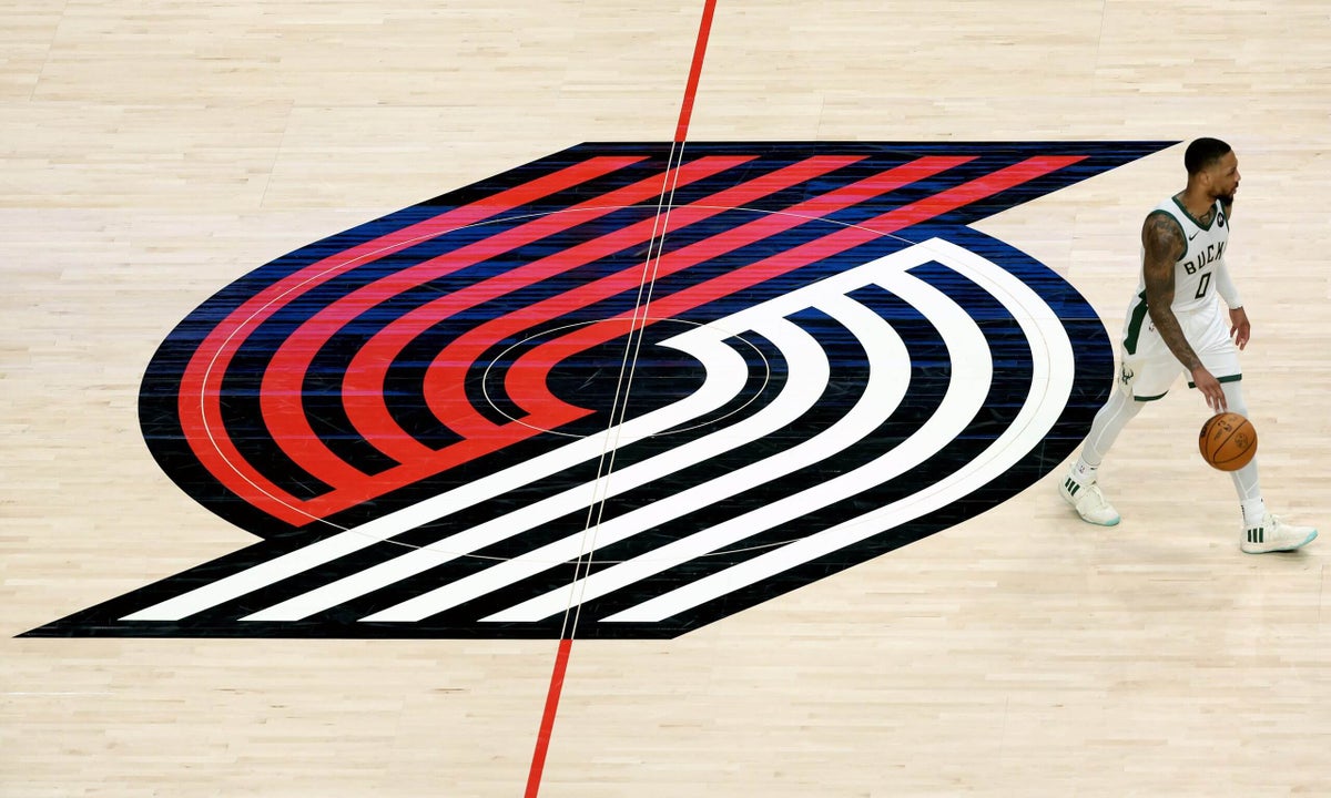 Group led by NHL Hurricanes owner Tom Dundon reaches agreement to buy Portland Trail Blazers
