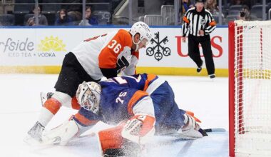ELMONT, NEW YORK - SEPTEMBER 21: Emil Andrae #36 of the Philadelphia Flyers scores the game winning goal in the shootout against Parker Gahagen #75 of the New York Islanders in a preseason game at UBS Arena on September 21, 2025 in Elmont, New York. The Flyers defeated the Islanders 3-2 in the shootout.