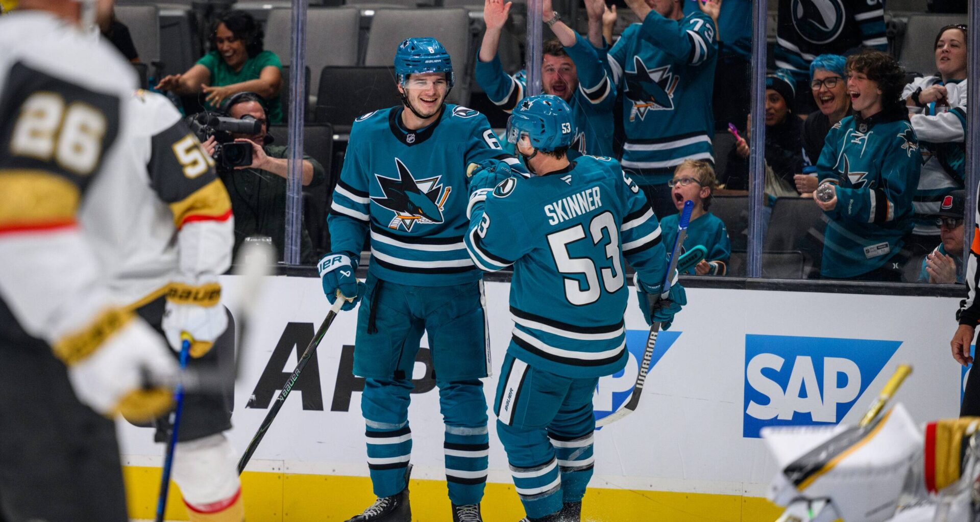 San Jose Sharks players Sam Dickinson and Jeff Skinner