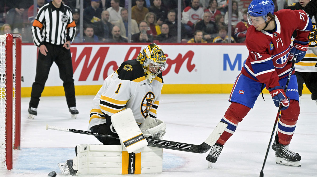  Boston Bruins goalie Jeremy Swayman (1) stops Montreal Canadiens forward Jake Evans (71) during the second period at the Bell Centre.