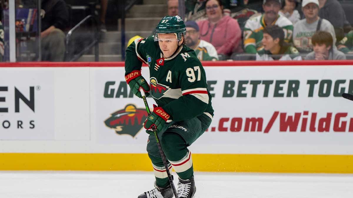 Minnesota Wild left wing Kirill Kaprizov (97) skates with the puck against the Chicago Blackhawks in the first period at Xcel Energy Center. 