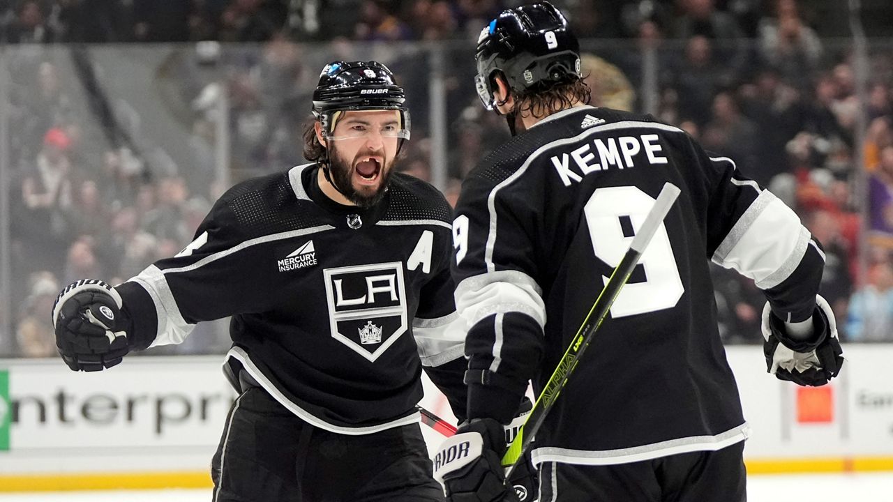 Los Angeles Kings defenseman Drew Doughty, left, celebrates his goal with right wing Adrian Kempe during the second period of an NHL hockey game against the Nashville Predators Thursday, Jan. 18, 2024, in Los Angeles. (AP Photo/Mark J. Terrill)