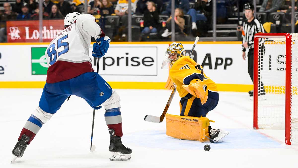 Nashville Predators goaltender Juuse Saros (74) blocks the shot of Colorado Avalanche center Nikita Prishchepov (85) during the second period at Bridgestone Arena