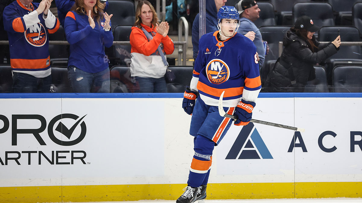 Cole Caufield and Ivan Demidov with the Canadiens logo in the background, Canadiens bold predictions
