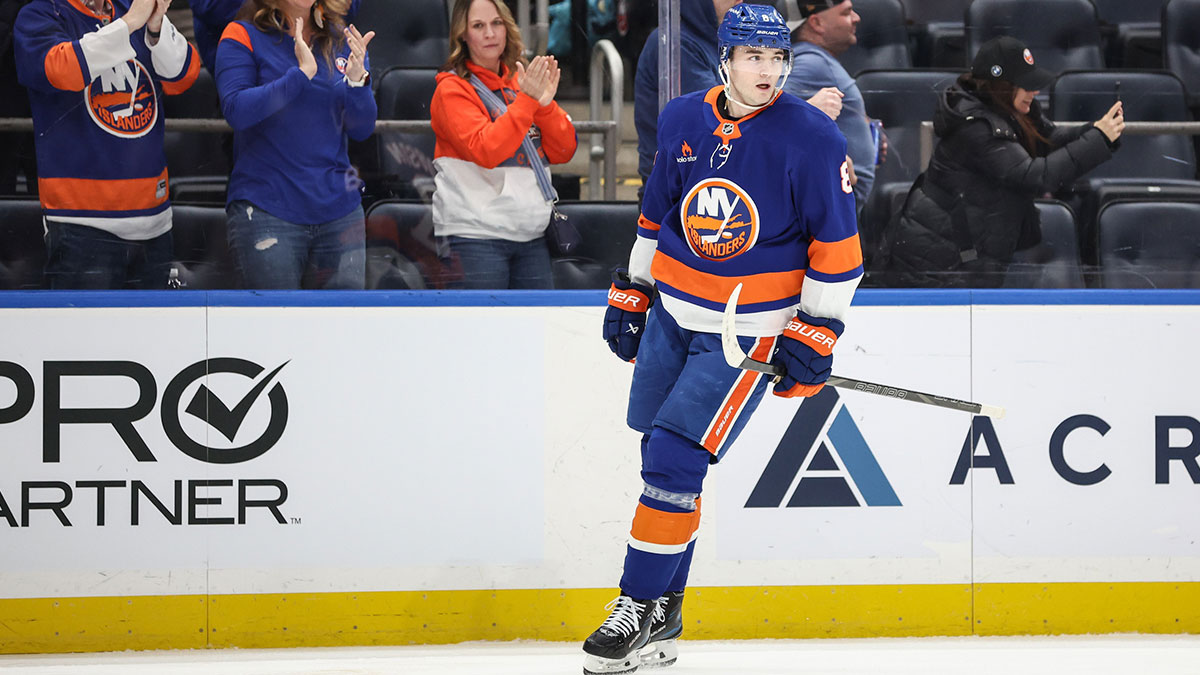 New York Islanders defenseman Noah Dobson (8) circles back to center ice after scoring a goal in the third period against the Minnesota Wild at UBS Arena.